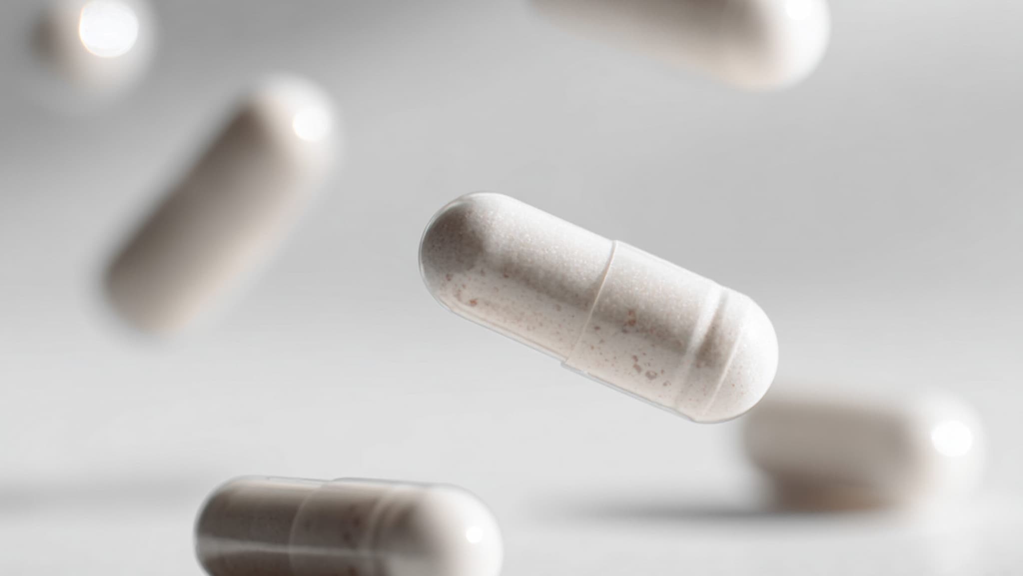 Foto von weißen länglichen Kapseln