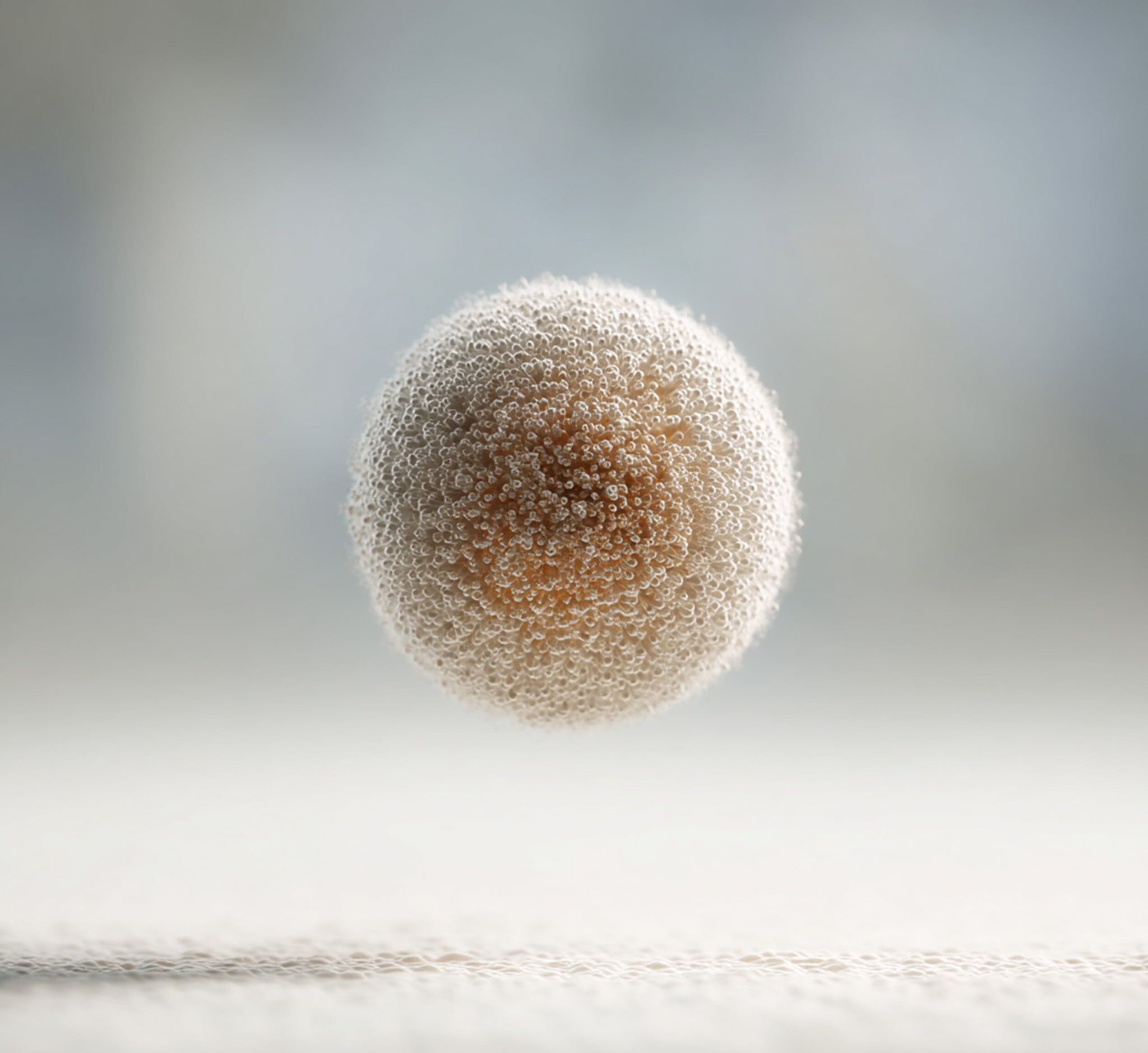 Bild einer schwebenden Kugel, KI-generiert